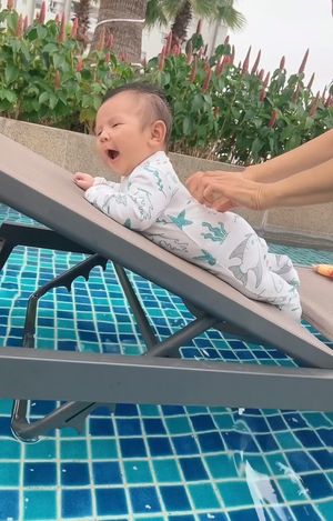 10w5d Tummy time with grandma in the swimming pool 🥰